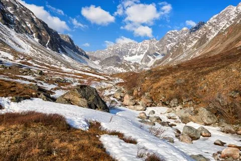 Valley of small brook in mountains of Eastern Siberia Stock Photos