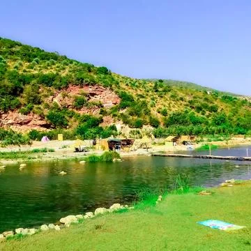 Valley stream running in the spring Stock Photos