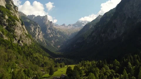 Valley on a sunny day between the alps mountains Stock Footage 161632964