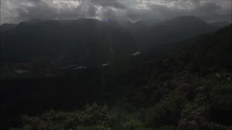 Valley under cloudy sun Stock Footage 235135466