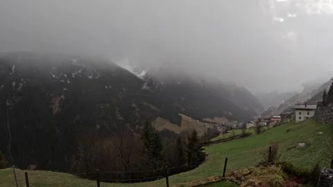 Valley View of the Mountains Clouds Ischgl Stock Footage 241056323