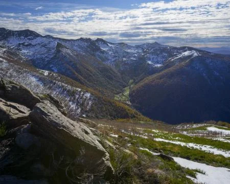 Valley view from the Ridge of a Mountain Range Stock Photos
