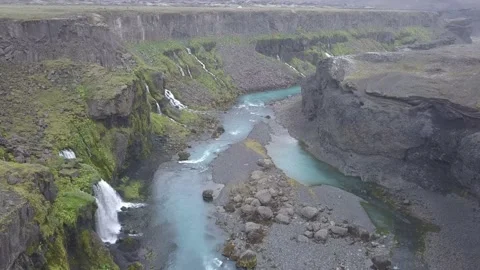 Valley with waterfalls in the Iceland's highland - view from drone. Stock Footage 196011953