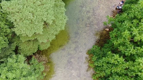 A valley where clear water flows to swim coolly in the hot summer, drone_10 Stock Footage 280179027