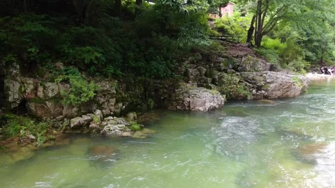 A valley where clear water flows to swim coolly in the hot summer,9 Stock Footage 280179075