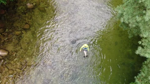 A valley where clear water flows to swim coolly in the hot summer, drone_8 Stock Footage 280179076