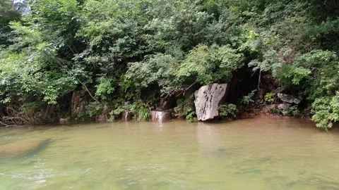 A valley where clear water flows to swim coolly in the hot summer_26 Stock Footage 280179115