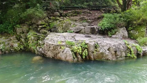 A valley where clear water flows to swim coolly in the hot summer_4 Stock Footage 280179148