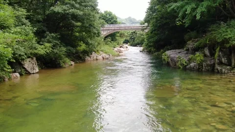 A valley where clear water flows to swim coolly in the hot summer_1 Stock Footage 280179177