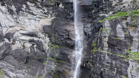 Vals - Cinematic view over its Alpine Dam Stock Footage 312699139