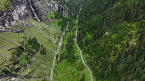 Vals - Cinematic view over its Alpine Dam Stock Footage 312699814