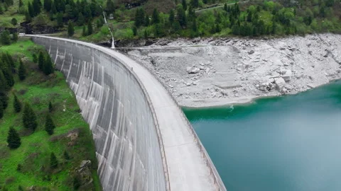 Vals - Cinematic view over its Alpine Dam Stock Footage 312700652