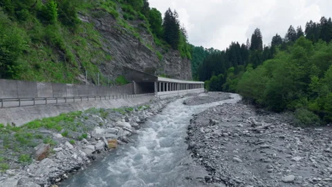 Vals - Cinematic view over its Alpine Dam Stock Footage 312701632