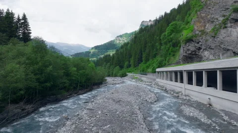Vals - Cinematic view over its Alpine Dam Stock Footage 312701746