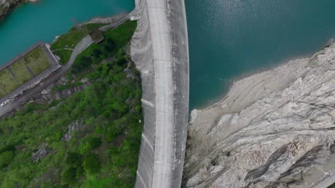 Vals - Cinematic view over its Alpine Dam Stock Footage 312723879