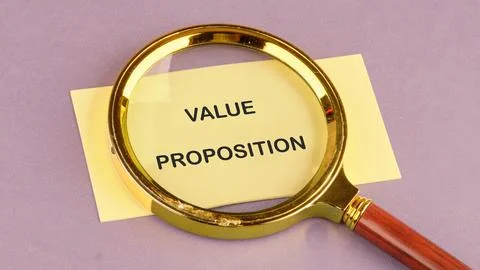 Value added concept. Words VALUE PROPOSITION on the yellow card, top view 스톡 사진