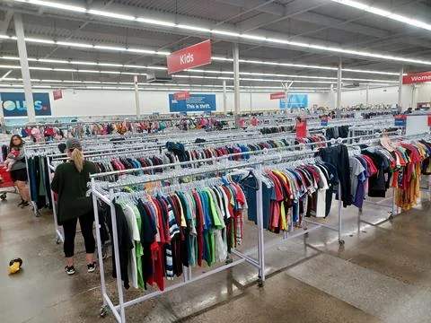 Value Village second hand store clothes department Stock Photos