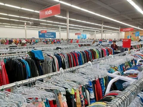 Value Village second hand store clothes department Stock Photos