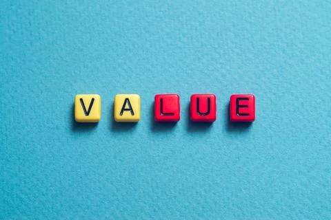 Value - word concept on cubes Stock Photos