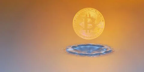 Valueable bitcoin with orange background and a impact from a drop Stock Photos