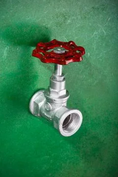 Valve on green Stock Photos