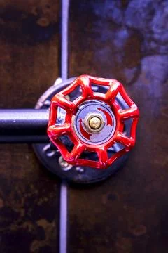Valve with the red handle. Foto stock