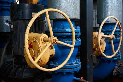 Valve with a yellow helm on the corpse. Stock Photos