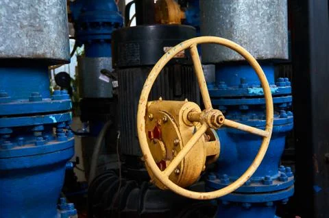 Valve with a yellow helm on the corpse. Stock Photos