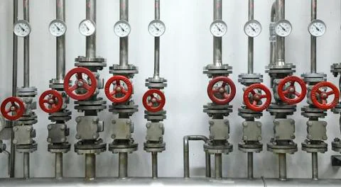 Valves on pipes Stock Photos