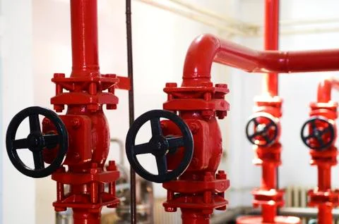 Valves on pipes Stock Photos