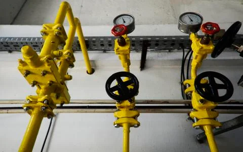 Valves on pipes Stock Photos