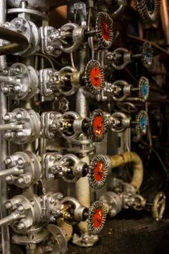 Valves on a submarine control panel Stock Photos