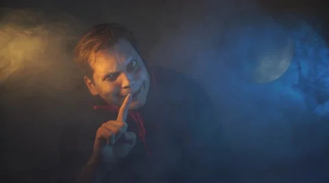 Vampire count Dracula waves his hand and transforms into a bat Stock Footage 68585147