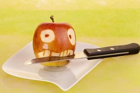 Vampire face in the apple Stock Photos