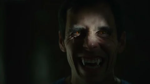 Vampire looks at the camera in the dark Stock-Footage 163988688