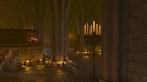 The vampire weeps in the tomb as the candles burn Stock Footage 244271898