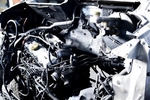 Van auto disassembled engine in mechanical workshop Stock Photos
