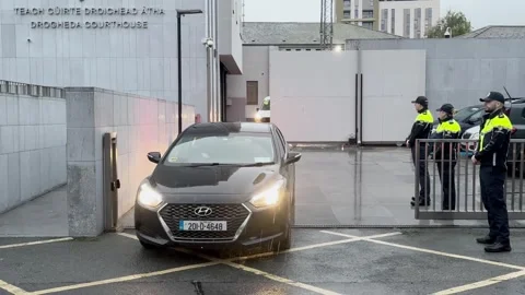 Van believed to be carrying Robert OConnor leaves Drogheda District Cour... Stock Footage 320961719