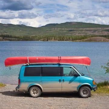 Van with canoe Stock Photos