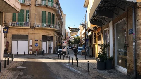 Van Car Pass inside Ledras Street at Morning Stock Footage 105876178