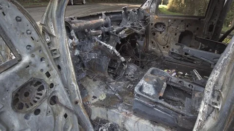 Van destroyed in a car fire Stock Footage 84223918