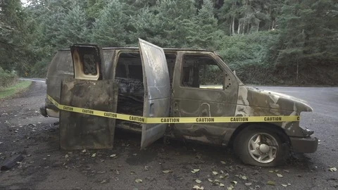 Van destroyed in a car fire Stock Footage 84223967