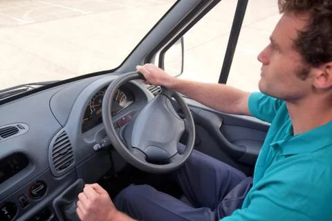 Van driver right hand drive vehicle. Stock Photos