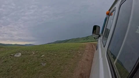 Van driving along the bumpy road Stock Footage 346804634