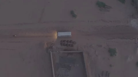 Van Driving Desert Road Overhead - Ungraded Stock Footage 322544381