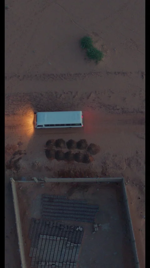 Van Driving Desert Road Overhead - Vertical (9:16) Stock Footage 322550816