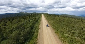 Van driving on a lonely road Stock Footage 86129112