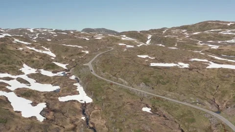 Van driving through mountain road 動画素材 137564201