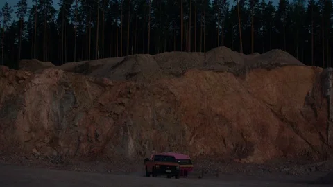 Van exploding in a fireball in slowmotion behind car driving past 動画素材 121921442