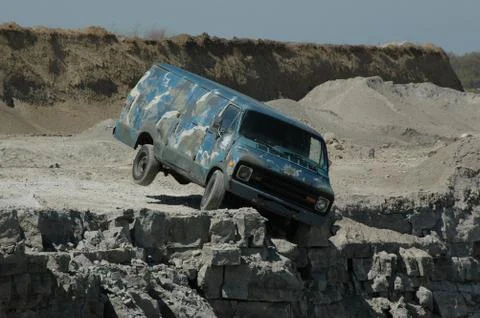 Van falling off cliff 01 Stock Photos